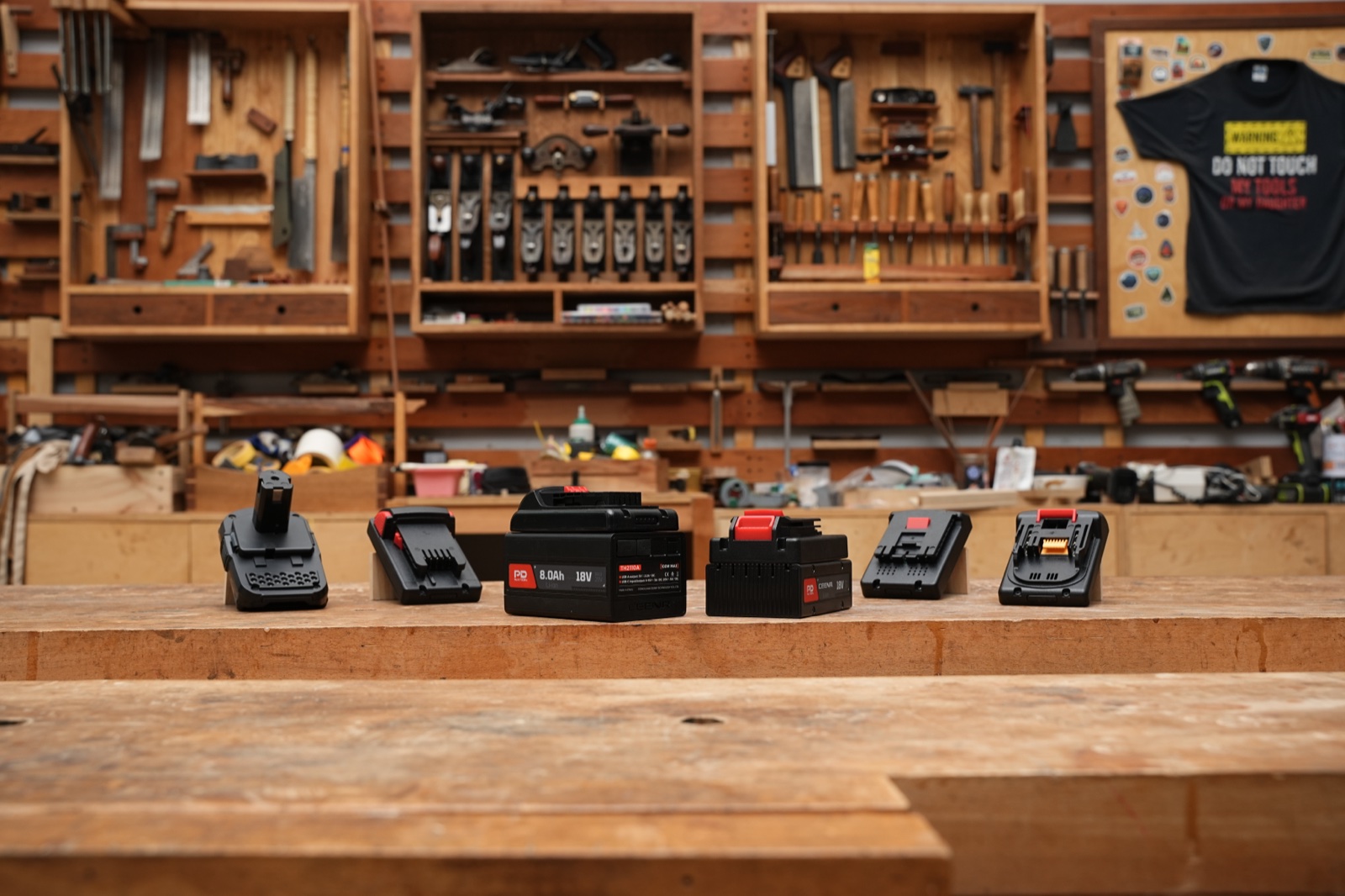 PDnation Pro with multiple Brand Mount adapters arranged on workbench